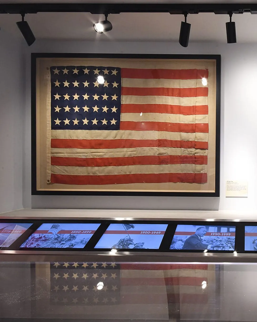 A historic American Flag on display at the National Flag Foundation