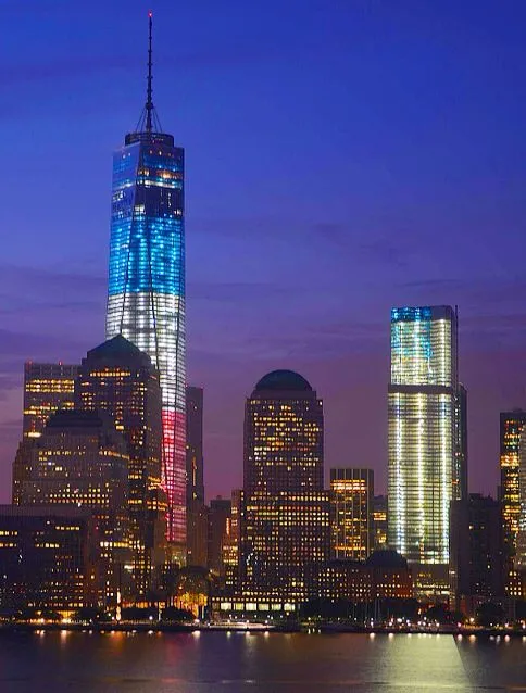 One World Trade Center lit red, white, and blue in New York, NY